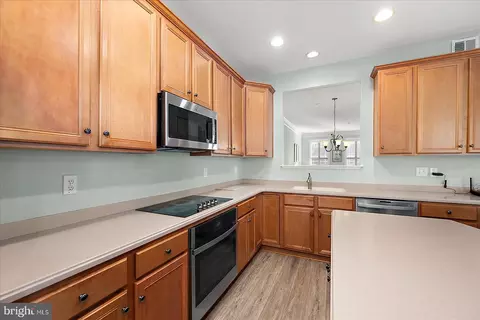 Kitchen - 11964 W War Dancer Ln #101, Berlin, MD 21811 photo 3 of 6