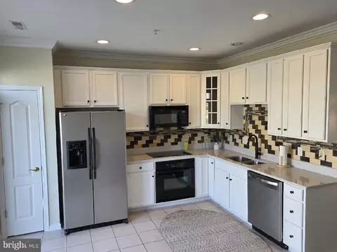 Kitchen - 303 Schooner Ln #102, Berlin, MD 21811 photo 1 of 1