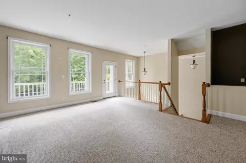 Living - 11964 W War Dancer Ln #103, Berlin, MD 21811 photo 3 of 10