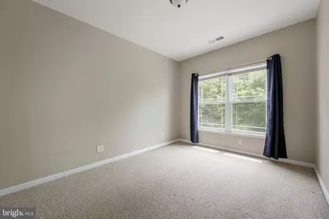 Bedroom - 11964 W War Dancer Ln #103, Berlin, MD 21811 photo 1 of 4