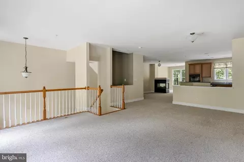 Living - 11964 W War Dancer Ln #103, Berlin, MD 21811 photo 2 of 10
