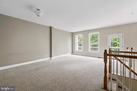 Living - 11964 W War Dancer Ln #103, Berlin, MD 21811 photo 4 of 10