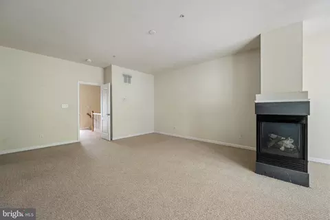 Living - 11964 W War Dancer Ln #103, Berlin, MD 21811 photo 8 of 10