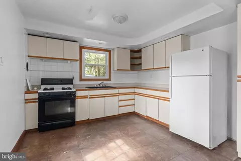 Kitchen - 52 E 9th Ave, Pine Hill, NJ 08021 photo 1 of 2