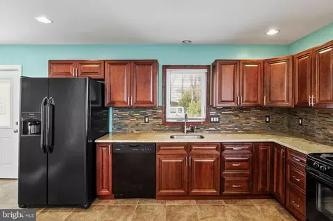 Kitchen - 501 W Evesham Rd, Runnemede, NJ 08078 photo 1 of 4