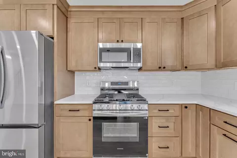 Kitchen - 50 E Buttonwood Ave, Pine Hill, NJ 08021 photo 3 of 4