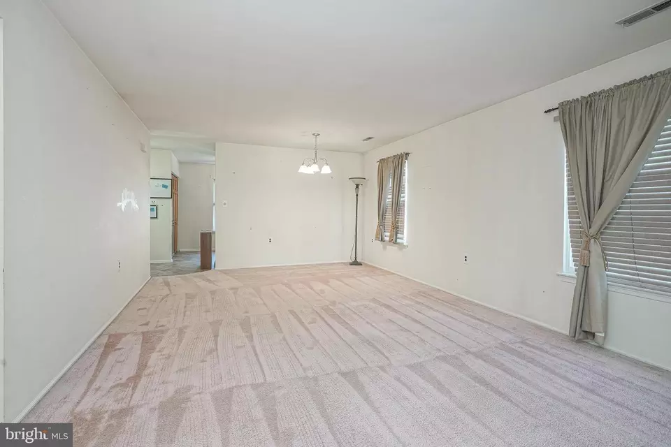 Living - 144 Lakebridge Dr, Deptford, NJ 08096 photo 3 of 4
