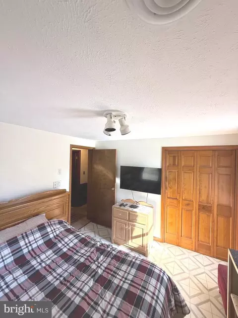 Bedroom - 711 Mountain View Dr, Schellsburg, PA 15559 photo 2 of 3