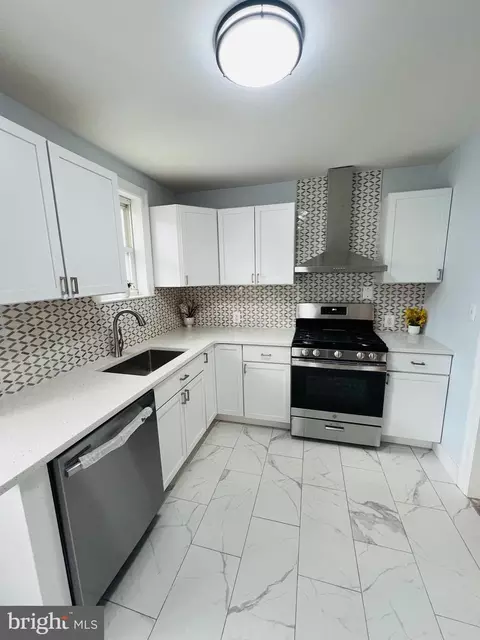 Kitchen - 138 N Cedar Ln, Darby, PA 19082 photo 8 of 10