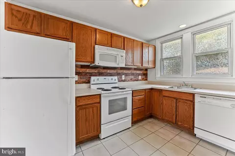 Kitchen - 935 Galbraith Ave, Chichester, PA 19061 photo 2 of 3