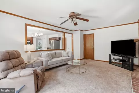 Living - 2437 W Colonial Dr, Upper Chichester, PA 19061 photo 7 of 11