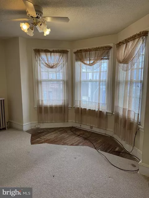 Living - 17 New St, Darby, PA 19082 photo 3 of 3