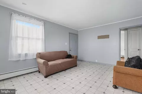 Living - 436 E Chestnut St, Hazleton, PA 18201 photo 2 of 2