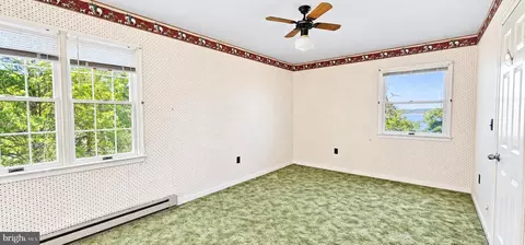 Bedroom - 35257 Cats Point Ln, Quinby, VA 23423 photo 4 of 10
