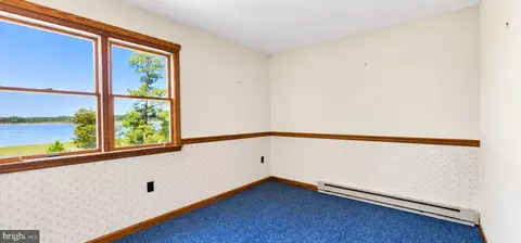 Bedroom - 35257 Cats Point Ln, Quinby, VA 23423 photo 6 of 10