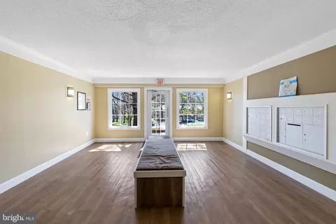 Living - 7640 Tremayne Pl #201, Mclean, VA 22102 photo 8 of 8