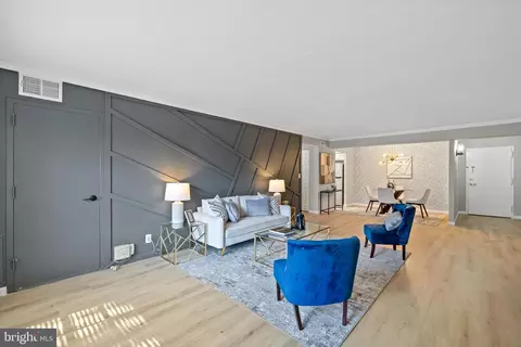 Living - 7640 Tremayne Pl #201, Mclean, VA 22102 photo 5 of 8
