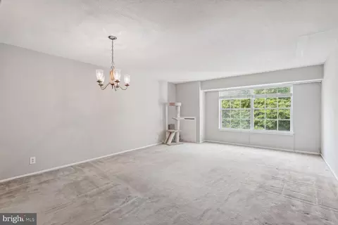 Living - 7600 Tremayne Pl #307, Mclean, VA 22102 photo 1 of 2
