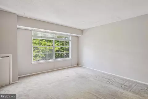 Living - 7600 Tremayne Pl #307, Mclean, VA 22102 photo 2 of 2