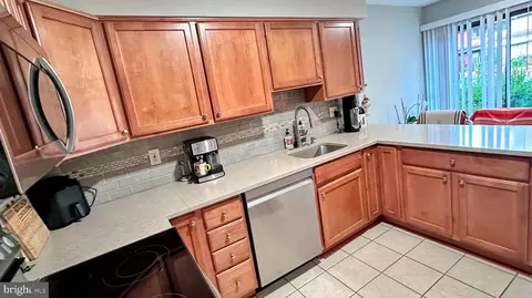 Kitchen - 2212 Coppersmith Sq, Reston, VA 20191 photo 2 of 2