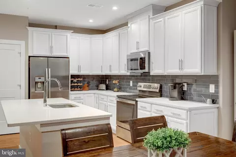 Kitchen - 1675 Bandit Loop #103B, Reston, VA 20190 photo 2 of 4