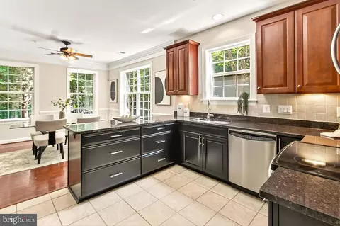 Kitchen - 7880 Rolling Woods Ct #104, Springfield, VA 22152 photo 4 of 7