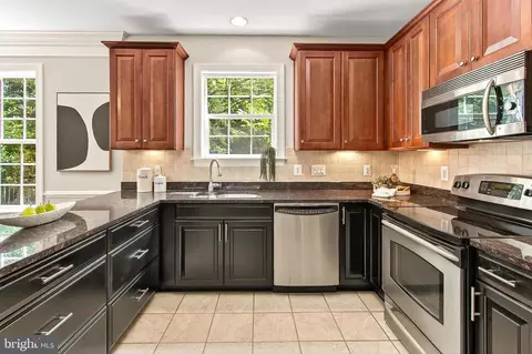 Kitchen - 7880 Rolling Woods Ct #104, Springfield, VA 22152 photo 3 of 7