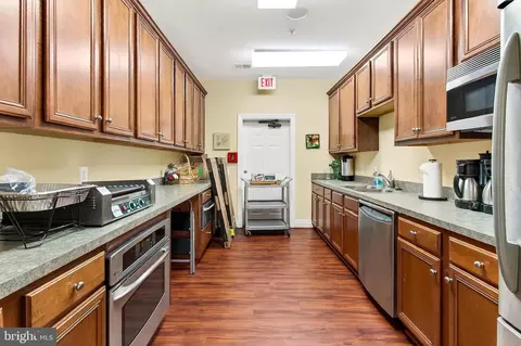 Kitchen - 7880 Rolling Woods Ct #104, Springfield, VA 22152 photo 7 of 7