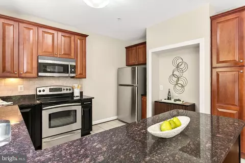 Kitchen - 7880 Rolling Woods Ct #104, Springfield, VA 22152 photo 2 of 7