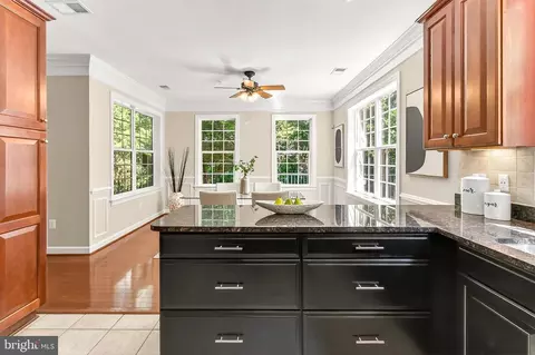 Kitchen - 7880 Rolling Woods Ct #104, Springfield, VA 22152 photo 5 of 7