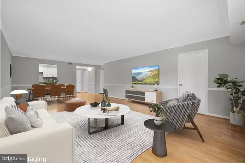 Living - 7621 Tremayne Pl #113, Mclean, VA 22102 photo 7 of 8