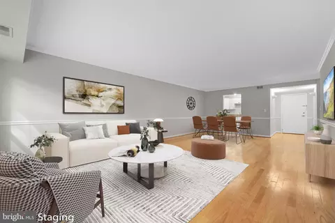 Living - 7621 Tremayne Pl #113, Mclean, VA 22102 photo 4 of 8