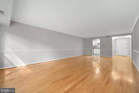 Living - 7621 Tremayne Pl #113, Mclean, VA 22102 photo 3 of 8