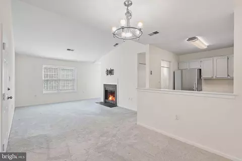 Living - 7802 Harrowgate Cir #D, Springfield, VA 22152 photo 2 of 3