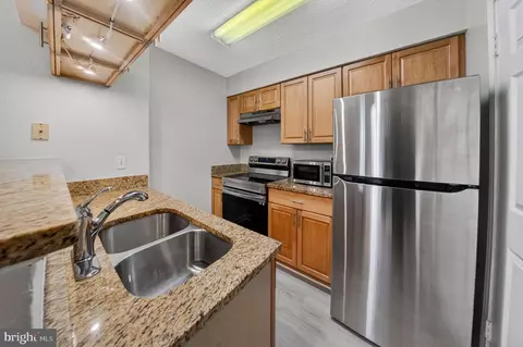 Kitchen - 1504 Lincoln Way #100, Mclean, VA 22102 photo 2 of 2
