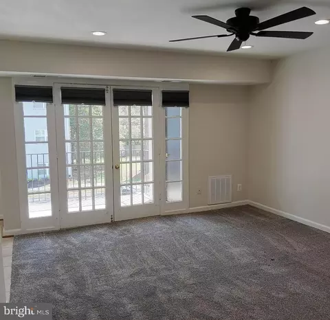 Living - 7097 Spring Garden Dr #101, Springfield, VA 22150 photo 1 of 7