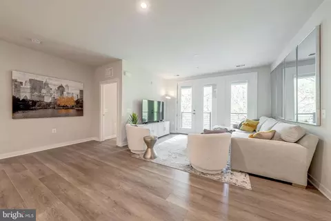 Living - 1669 Bandit Loop #406A, Reston, VA 20190 photo 2 of 4