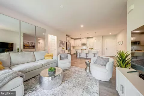 Living - 1669 Bandit Loop #406A, Reston, VA 20190 photo 4 of 4