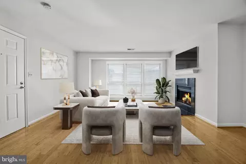 Living - 3175 Summit Square Dr #5-E12, Oakton, VA 22124 photo 2 of 7
