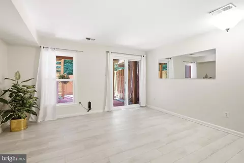 Living - 8434 Springfield Oaks Dr, Springfield, VA 22153 photo 11 of 12
