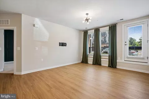 Living - 1669 Bandit Loop #105A, Reston, VA 20190 photo 3 of 5