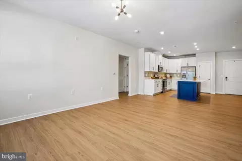Living - 1669 Bandit Loop #105A, Reston, VA 20190 photo 4 of 5