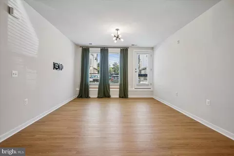Living - 1669 Bandit Loop #105A, Reston, VA 20190 photo 1 of 5