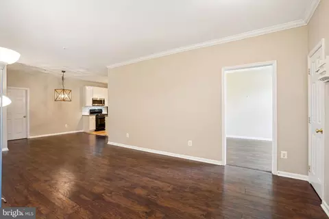 Living - 43935 Hickory Corner Ter #101, Ashburn, VA 20147 photo 2 of 3