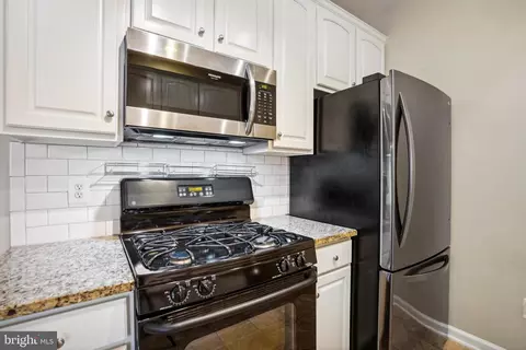 Kitchen - 43935 Hickory Corner Ter #101, Ashburn, VA 20147 photo 2 of 3