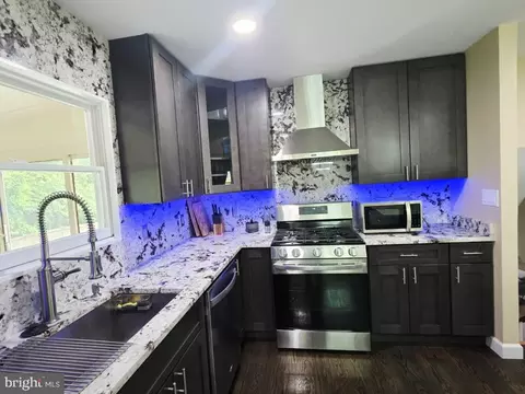 Kitchen - 402 W Maple Ave, Sterling, VA 20164 photo 1 of 4