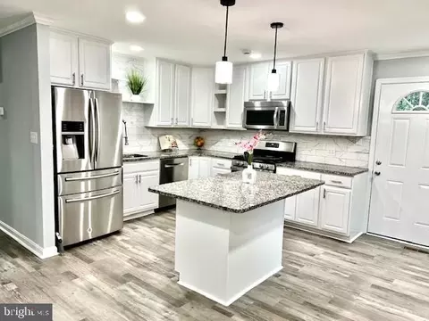 Kitchen - 406 W Maple Ave, Sterling, VA 20164 photo 1 of 26