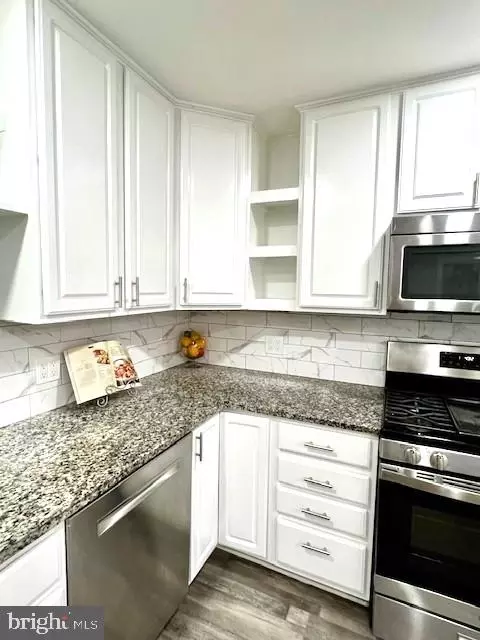 Kitchen - 406 W Maple Ave, Sterling, VA 20164 photo 16 of 26