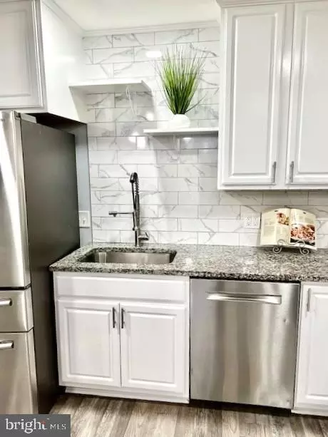 Kitchen - 406 W Maple Ave, Sterling, VA 20164 photo 3 of 26
