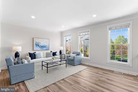 Living - 21555 Trowbridge Sq, Ashburn, VA 20147 photo 2 of 6